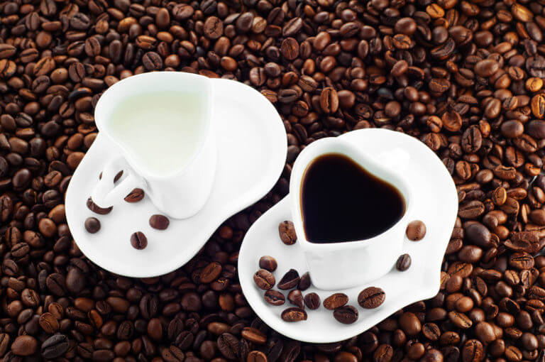 Cup of milk and coffee cup