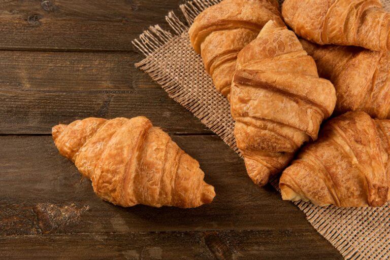 Breakfast croissant on a rustic background