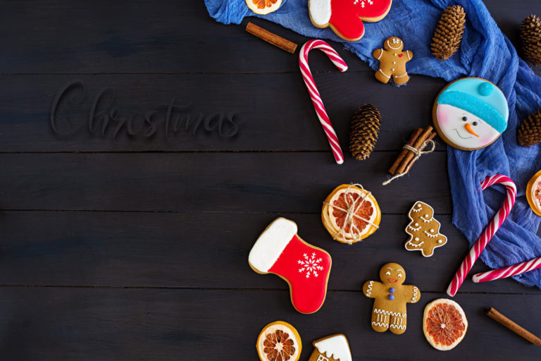 christmas-sweets-ginger-cookies-on-wooden-background