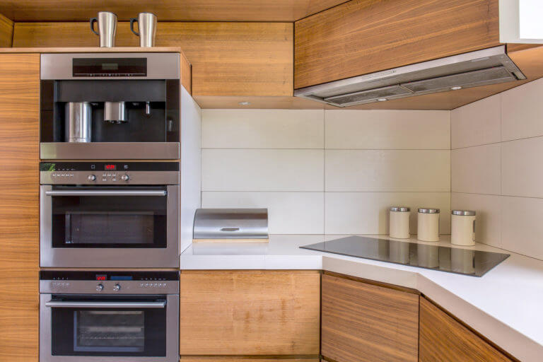 modern-kitchenette-with-wooden-furniture-PJ7WDVQ