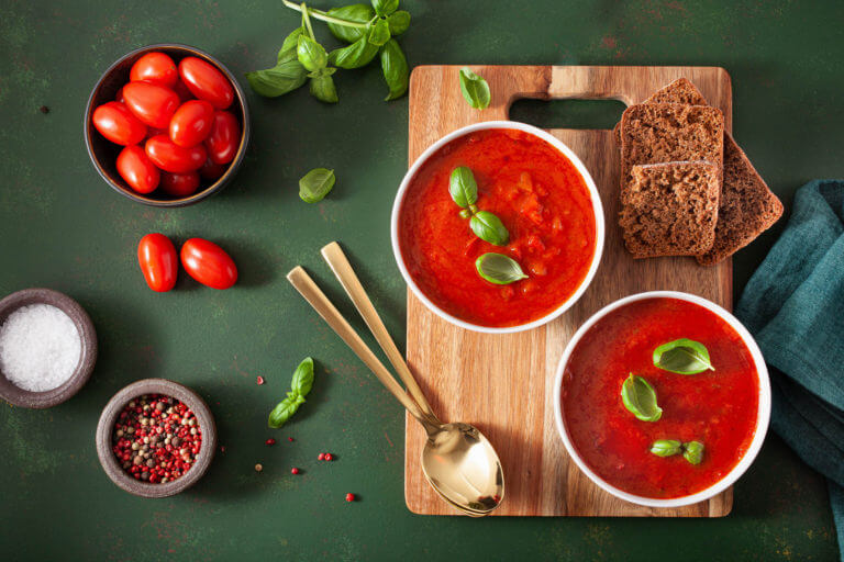 tomato-and-bell-pepper-vegetarian-soup-on-green-ba